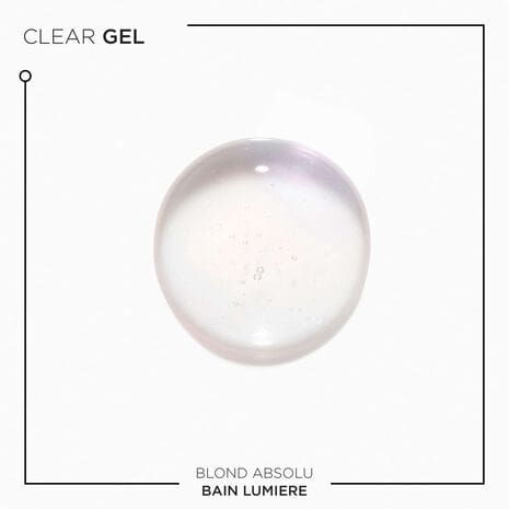 an image of the blond absolu lumiere shampoo texture on a white background.