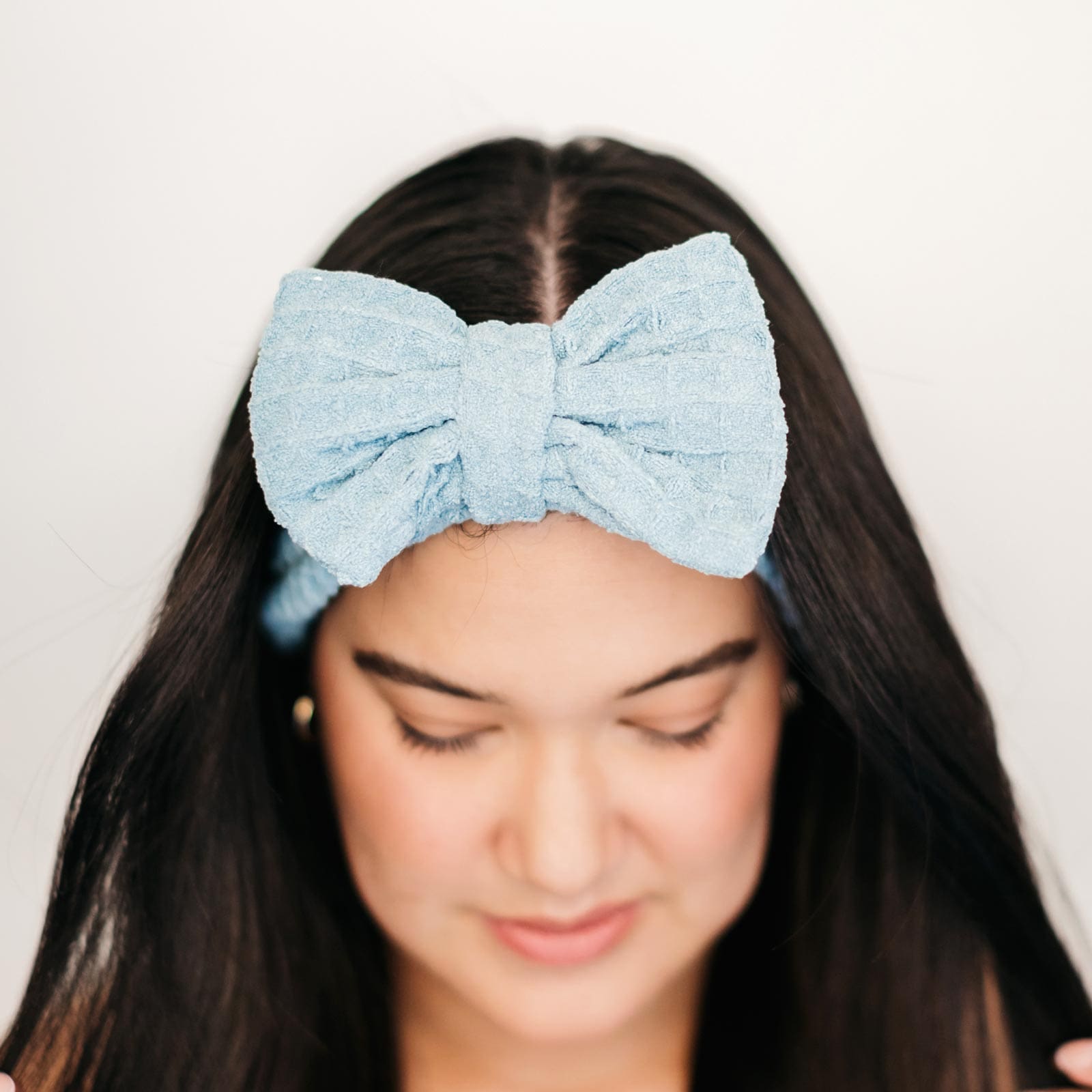an image of a girl wearing a headband